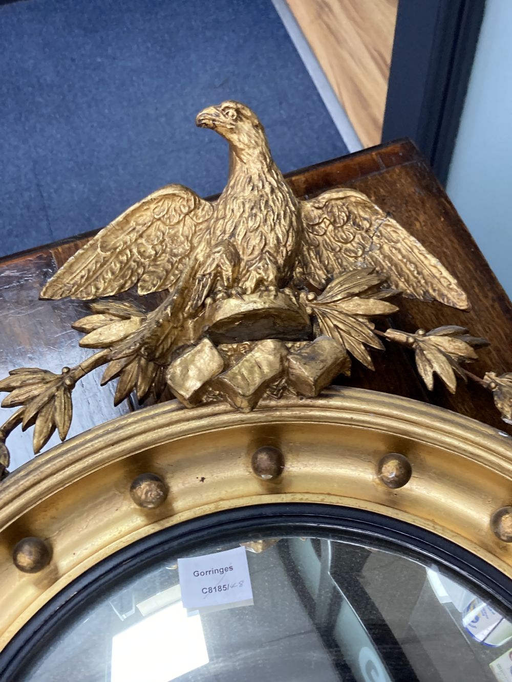 A Regency style giltwood convex mirror, diameter 50cm